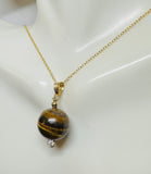 14 Karat Yellow Gold Filled Genuine 14mm Tiger's Eye Bead with CZ Accent Pendant on 18" Sterling Silver Gold-plated Cable Link Chain