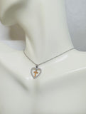 Sterling Silver with 10 Karat Rose Gold Cross Inside Genuine Diamond Heart Pendant with 18" Chain