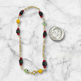10 Karat Yellow Gold Genuine 4mm Azabache Jet and Orisha Orula Lucky Eyes Figaro Link 7.5" Bracelet