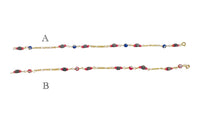 10 Karat Yellow Gold Genuine 4mm Azabache Jet and Blue or Red Lucky Eyes Figaro Link 7.5" Bracelet