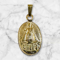 10 Karat Yellow Gold Our Lady of Charity "Caridad del Cobre" 14 x 10mm Oval Medal