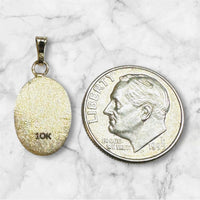 10 Karat Yellow Gold Our Lady of Charity "Caridad del Cobre" 14 x 10mm Oval Medal