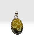 Vintage NOS 1970's Oval 18 x 13mm Zodiac Brown/Ivory Zodiac Pendant