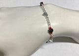 Sterling Silver Genuine Azabache Jet & Coral Heart Charms Rolo Link 7" Bracelet