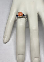 Sterling Silver Genuine 9mm Pink Coral and Lab Created Blue Sapphire Ring