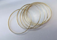 14Kt Yellow Gold Polished Handmade 7 Bangles "Semanario" Set