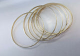 14Kt Yellow Gold Polished Handmade 7 Bangles "Semanario" Set