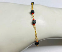 14 Karat Yellow Gold Genuine 4mm Azabache Jet & Coral 7" Curb Link Bracelet