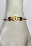 14 Karat Yellow Gold Genuine Azabache Jet-Coral Our Lady of Guadalupe Medal 7" Curb Bracelet