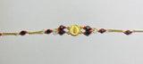 14 Karat Yellow Gold Genuine Azabache Jet-Coral Our Lady of Guadalupe Medal 7" Curb Bracelet