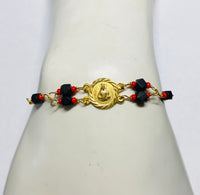 14 Karat Yellow Gold Genuine Azabache Jet-Coral Saint Barbara Medal 7.5" Curb Bracelet