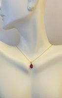 14 Karat Yellow Gold Genuine 7 x 5mm Oval Ruby Pendant (Available with or without chain)