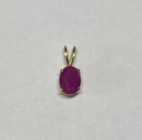 14 Karat Yellow Gold Genuine 7 x 5mm Oval Ruby Pendant (Available with or without chain)