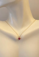 14 Karat Yellow Gold Genuine 5mm Round Ruby Pendant (Available with or without chain)