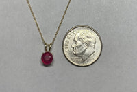 14 Karat Yellow Gold Genuine 5mm Round Ruby Pendant (Available with or without chain)