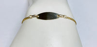 14 Karat Yellow Gold Curb Link Oval ID 7" Bracelet