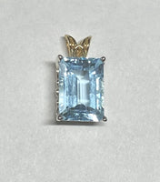 Sterling Silver & 14K Gold Genuine 14mm x 10mm Blue Topaz Pendant