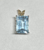 Sterling Silver & 14K Gold Genuine 14mm x 10mm Blue Topaz Pendant