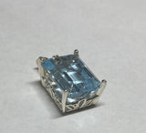 Sterling Silver & 14K Gold Genuine 14mm x 10mm Blue Topaz Pendant