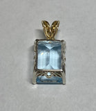 Sterling Silver & 14K Gold Genuine 14mm x 10mm Blue Topaz Pendant