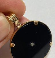 14 Karat Yellow Gold and Genuine Black Onyx Fleur-de-Lis Pendant