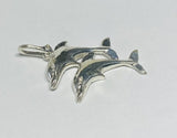 Sterling Silver Jumping Dolphins Pendant with Genuine Diamond Eyes