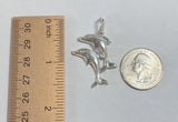 Sterling Silver Jumping Dolphins Pendant with Genuine Diamond Eyes