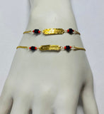 10 Karat Yellow Gold Dios Me Bendiga or God Bless Me Genuine Azabache Jet-Coral Curb Link 6 1/2" Kids Bracelet