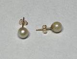 Genuine 6mm White Round Freshwater Pearl Stud Earrings set in 14 Karat Yellow Gold