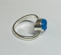 Sterling Silver Genuine Blue Chalcedony 8mm x 6mm Cabochon Bypass Ladies Ring