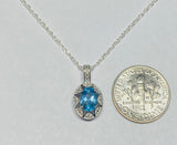 Sterling Silver Genuine Swiss Blue Topaz and Diamond Pendant with 18" Loose Rope Chain