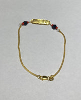 10 Karat Yellow Gold Dios Me Bendiga or God Bless Me Genuine Azabache Jet-Coral Curb Link 6 1/2" Kids Bracelet