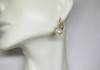 14 Karat Yellow Gold Genuine 7mm Freshwater Pearl and 0.10 carat TW Diamond Lever Back Earrings