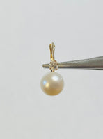 14 Karat Yellow Gold Genuine 7mm Freshwater Pearl and 0.10 carat TW Diamond Lever Back Earrings