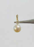 14 Karat Yellow Gold Genuine 7mm Freshwater Pearl and 0.10 carat TW Diamond Lever Back Earrings