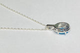 Sterling Silver Genuine Swiss Blue Topaz and Diamond Pendant with 18" Loose Rope Chain