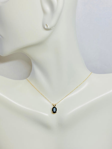 14 Karat Yellow Gold and Genuine 7 x 5mm Oval Dark Sapphire (0.80 ct) Pendant with or w/o Chain