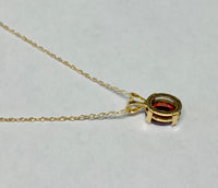 14 Karat Yellow Gold and Genuine 7 x 5mm Oval Garnet (1 carat) Pendant with or w/o Chain