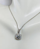 Sterling Silver and Genuine 1.00 Carat Moissanite Halo Pendant with Chain