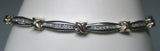 Sterling Silver & 14KT Yellow Gold Genuine 0.40 CTW Diamond "X" Bracelet