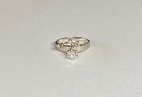 Vintage 1960's NOS 18 Karat White Gold and Genuine 0.25ctw Diamond Solitaire Ring