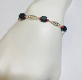 14 Karat Yellow Gold Filled Genuine Azabache Jet and Coral Accent 8" Plaque Bracelet