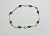 14 Karat Yellow Gold Filled Genuine 5mm Malachite Beads 8.25in Plaque Bracelet