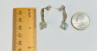 14 Karat White and Yellow Gold Genuine Sky Blue Topaz and Diamond Dangle Post Earrings