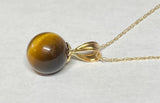 14 Karat Yellow Gold Genuine 9mm Tiger's Eye Bead Pendant (Available with chain)