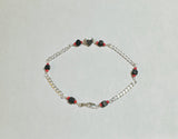 Sterling Silver Genuine 4mm Azabache with Coral Accents Heart Bracelet with Curb Link Chain