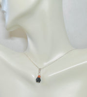 Sterling Silver and Genuine 5-6mm Azabache Jet with 4mm Venturina Charm (Available with or without chain)