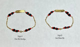 10 Karat Yellow Gold Genuine 4mm Azabache Jet 6" Figaro Link "Dios Me Bendiga OR God Bless Me" Baby Bracelet