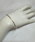 18 Karat Yellow Gold-plated Sterling Silver Diamond-cut 2mm Bangle Bracelet (7" or 8" Size)