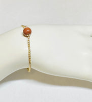 10 Karat Yellow Gold Curb Link Bracelet with 9mm Brown Goldstone Venturina Bead